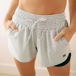 Albion Fit White Dash Lunge Shorts, size small.